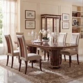 Monte Carlo LUX dining table in a dining room with framed architectural prints, luxury Italian decor