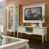 Monte Carlo TV wall panel in solid wood with ivory lacquer finish, elegant living room composition.