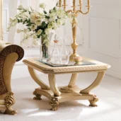Prestige squared coffee table with floral arrangement.