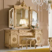 Prestige vanity dresser in carved wood with mirror.