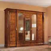 Elegant handcrafted Regina wooden wardrobe for luxurious villa interiors, Italian design, rich finish, with mirrored doors.
