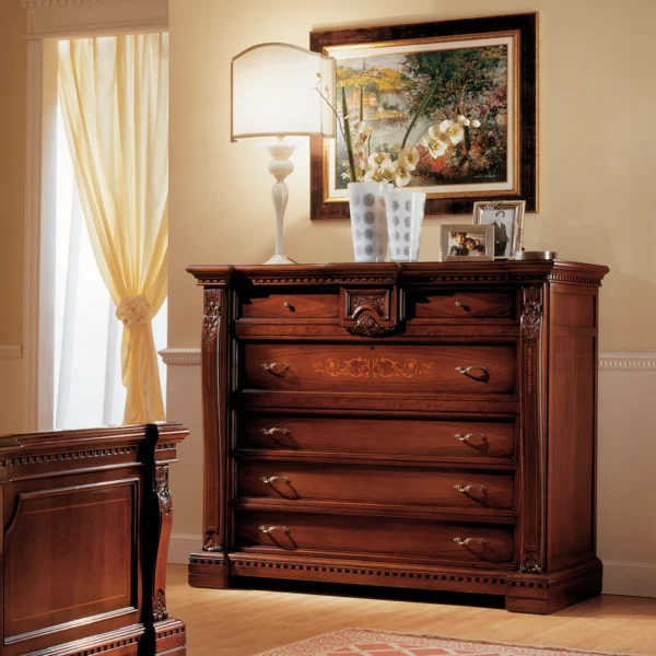 Handmade Italian Regina wooden dresser with ornate details and decor, enhancing classic villa interiors.