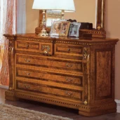 Handcrafted Italian Regina wooden dresser with ornate details and decorative accents, perfect for luxury interiors.