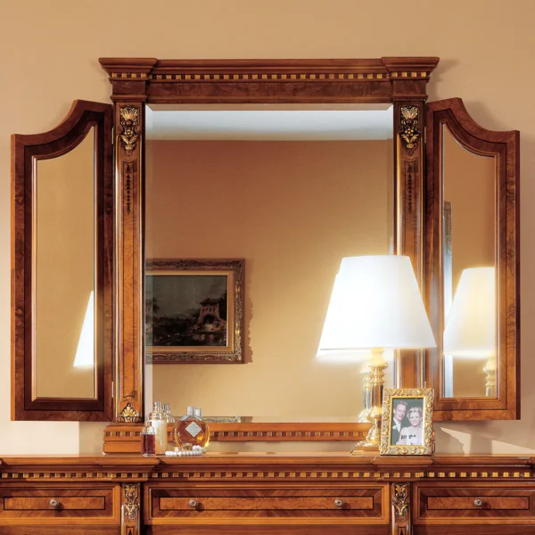 Handcrafted Regina wooden dresser with ornate mirror, framed photo, and elegant lamp for luxury villa interiors.