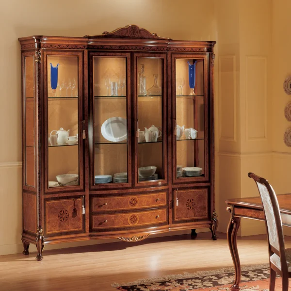 Royal display cabinet 4 doors showcasing fine china and crystal glassware in a luxury interior setting.