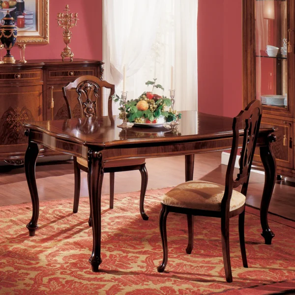 Royal extendable dining table, closed position, in a luxurious dining room.