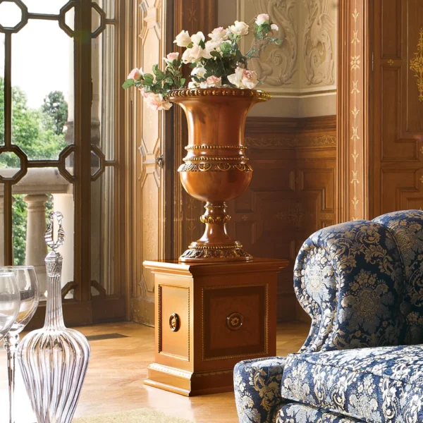Senator flower stand in carved wood with floral arrangement, in a luxury setting.