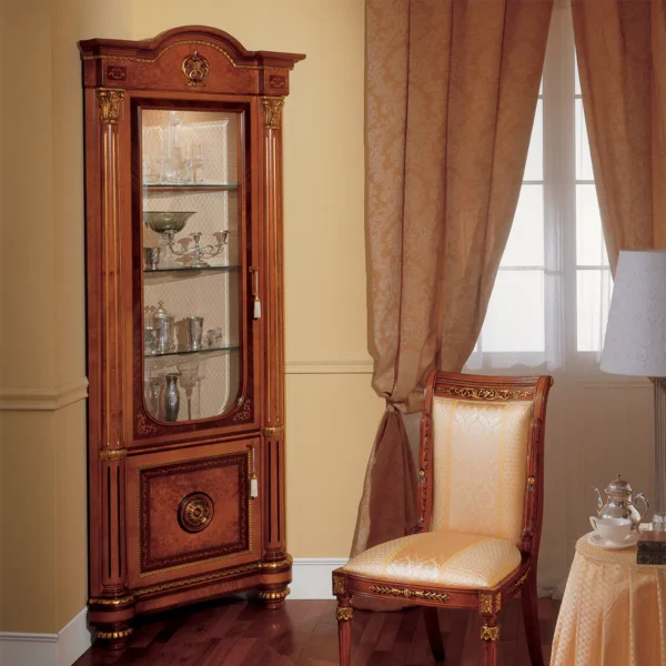 Elegant handcrafted Senator corner cabinet and chair in luxurious Italian interior design.