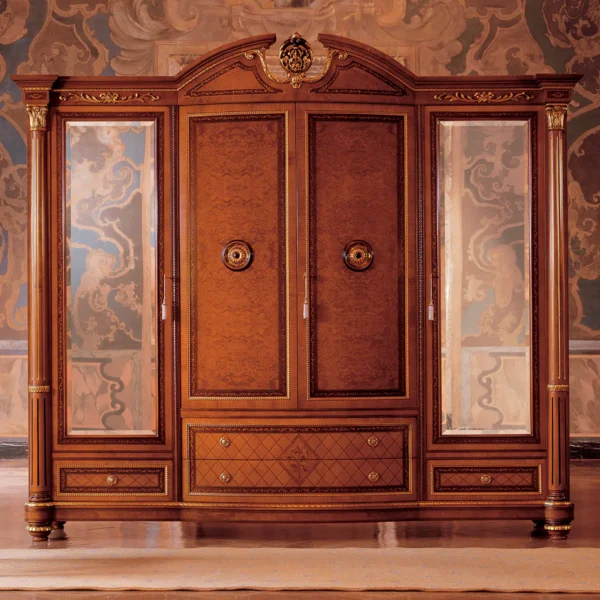 Elegant handcrafted Senator wardrobe with ornate carvings, ideal for luxury villa interiors.