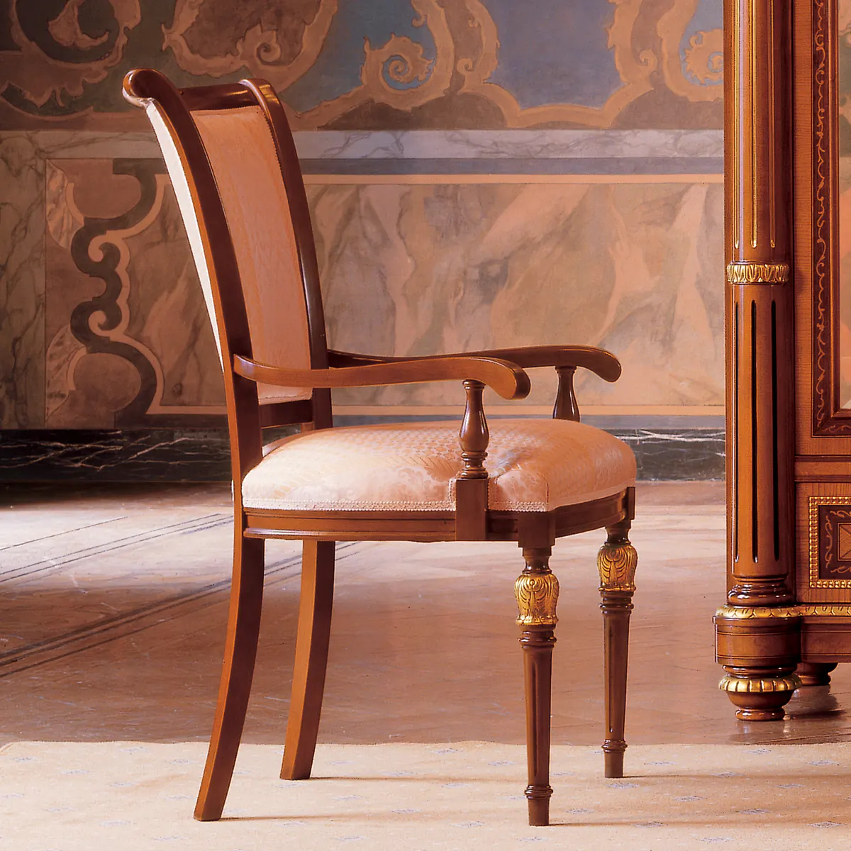SENATOR dining armchair Senator armchair in carved wood with decorative details, ideal for villas and luxury interiors.
