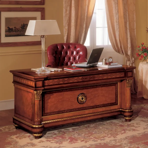 Luxurious handcrafted Senator writing desk and leather chair in an elegant office setting.
