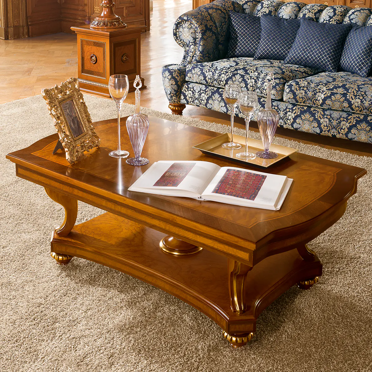 SENATOR rectangular coffee table Handcrafted Senator rectangular coffee table with decorative items, in a luxurious living room.